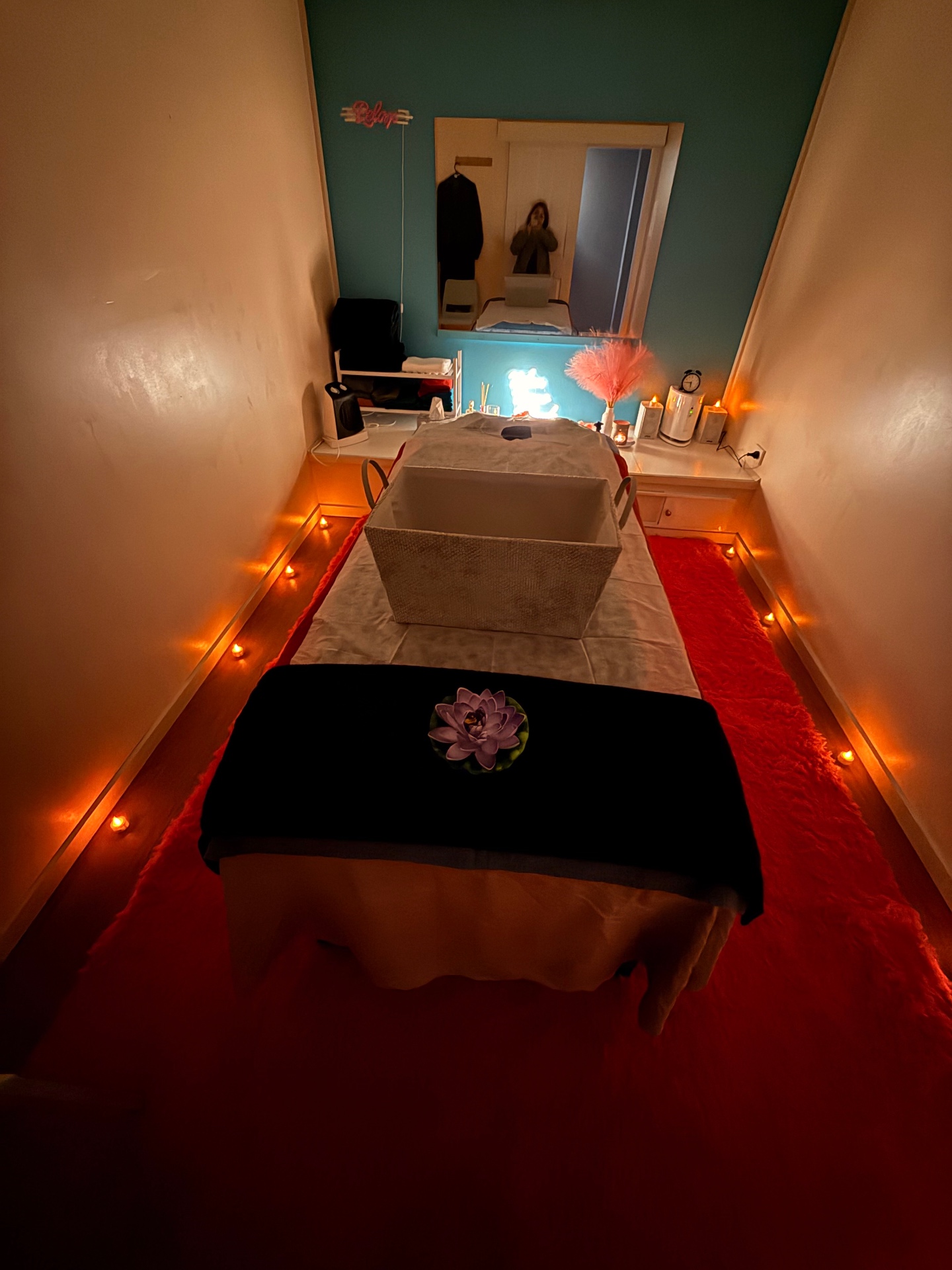 The candlelit massage room at Velvet Touch